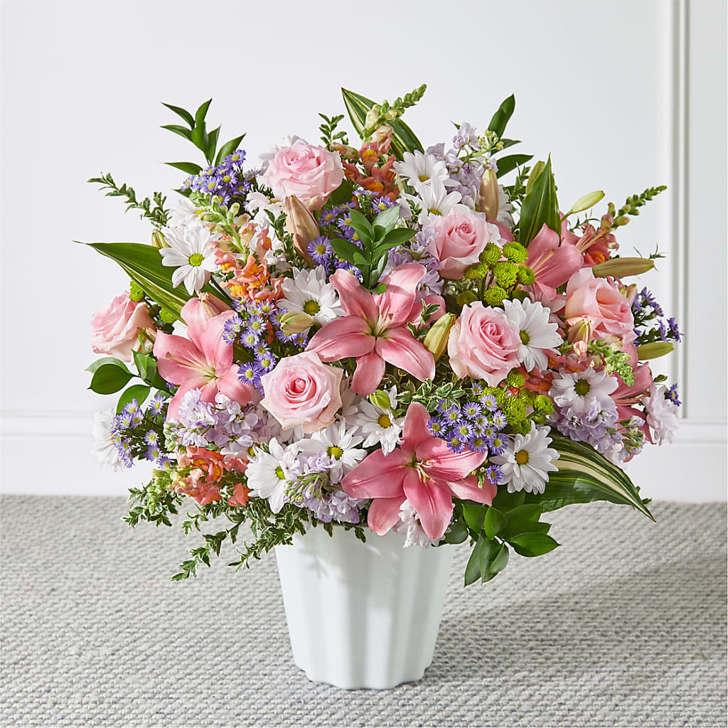 lilies flower shop wichita Abundant Compassion Floor Basket – green, lavender, orange, pink flower  arrangement | Wichita, KS